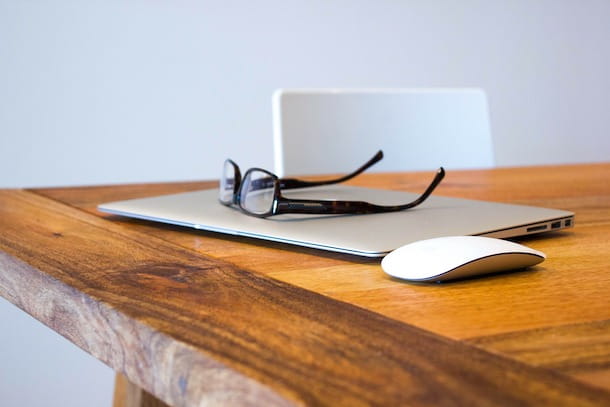 MacBook, mouse and glasses